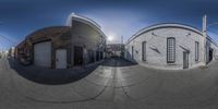 360 - view of a street in a building with an alley and street lamp poles