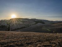 Sunlit Tuscany Hills: A Beautiful Landscape in Italy