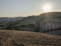 Sunlit Tuscany Hills: A Beautiful Landscape in Italy