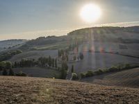 Sunlit Tuscany Hills: A Beautiful Landscape in Italy