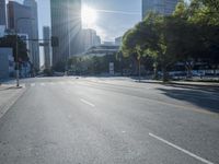 the sun shines brightly on a quiet urban street in san francisco, california, during the day