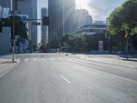 the sun shines brightly on a quiet urban street in san francisco, california, during the day