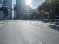 the sun shines brightly on a quiet urban street in san francisco, california, during the day