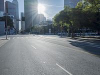 the sun shines brightly on a quiet urban street in san francisco, california, during the day