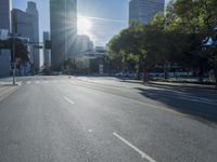 the sun shines brightly on a quiet urban street in san francisco, california, during the day