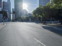 the sun shines brightly on a quiet urban street in san francisco, california, during the day