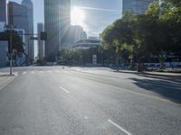 the sun shines brightly on a quiet urban street in san francisco, california, during the day