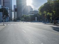 the sun shines brightly on a quiet urban street in san francisco, california, during the day