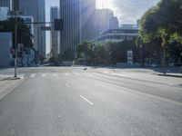 the sun shines brightly on a quiet urban street in san francisco, california, during the day