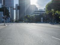 the sun shines brightly on a quiet urban street in san francisco, california, during the day