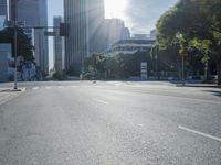 the sun shines brightly on a quiet urban street in san francisco, california, during the day