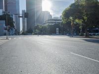 the sun shines brightly on a quiet urban street in san francisco, california, during the day