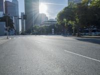 the sun shines brightly on a quiet urban street in san francisco, california, during the day