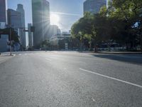 the sun shines brightly on a quiet urban street in san francisco, california, during the day