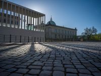 Sunny Berlin: Modern Architecture on Cobblestone Streets