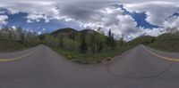 there is a wide view of the mountain from outside the camera angle on this road