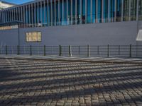 Sunny Day in Berlin: Clear Skies and Cobblestone Urban