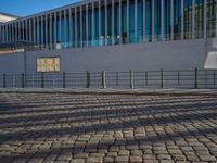 Sunny Day in Berlin: Clear Skies and Cobblestone Urban