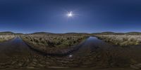 an image of an image of a sunny day in the desert from two fish - eye lenses