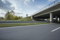 Sunny Day on Germany's Rural Highway with Concrete Bridge