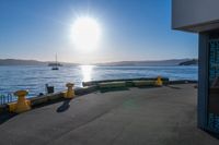 the sun shines brightly over the ocean on a sunny day at a marina in san francisco, california