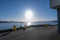 the sun shines brightly over the ocean on a sunny day at a marina in san francisco, california