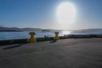 the sun shines brightly over the ocean on a sunny day at a marina in san francisco, california