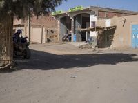 A Sunny Day in a Moroccan Village: Houses on the Sand Streets
