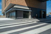 an outside space with stairs and building on a sunny day in the city of sydney