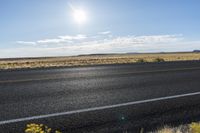 Sunny Day in Utah: Asphalt Road through the Desert