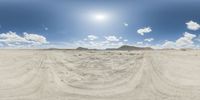 there is a photo taken looking at the landscape in this fisheye lens image, from a 360 - angle