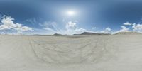 there is a photo taken looking at the landscape in this fisheye lens image, from a 360 - angle