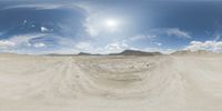 there is a photo taken looking at the landscape in this fisheye lens image, from a 360 - angle