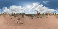 there is a photo taken looking at the landscape in this fisheye lens image, from a 360 - angle