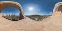 there is a photo taken looking at the landscape in this fisheye lens image, from a 360 - angle