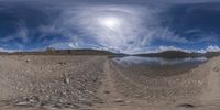 there is a photo taken looking at the landscape in this fisheye lens image, from a 360 - angle