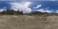 there is a photo taken looking at the landscape in this fisheye lens image, from a 360 - angle