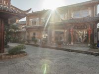 the sun shines brightly on a sunny day in a chinese courtyard or patio area