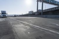 Sunny Highway with Motion Blur on Asphalt Road