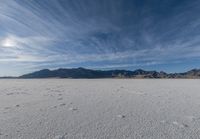 this vast salt flat looks like an incredible place to live in the desert, in the daytime