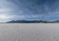 this vast salt flat looks like an incredible place to live in the desert, in the daytime