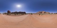 a picture of a desert landscape from an angle with an unusual fisheye lens image