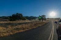 Sunrise on a Rural Road: Capturing the Agriculture Scene