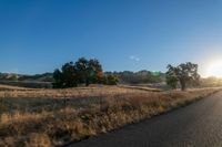 Sunrise over Rural Landscape with Road