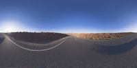 this is a 360 - 360 picture of an empty road on which there are no cars