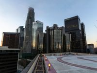 city buildings in a large metropolitan city at sunset, in the early hours of this image