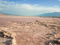 a view of a plain that has been covered in water and sand at the same time