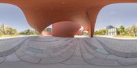 a view of a public space through the lens of a fish eye view image from an outside area