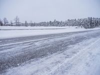 Sweden Winter Landscape: A Road Leading Through Snowy Trees