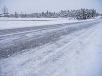 Sweden Winter Landscape: A Road Leading Through Snowy Trees